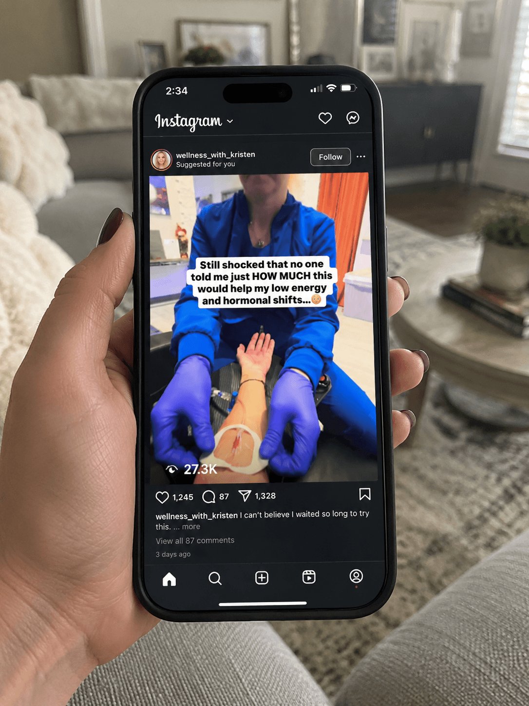 A person scrolling Instagram on a phone and seeing a suggested local wellness business video with thousands of views, likes, comments, and shares